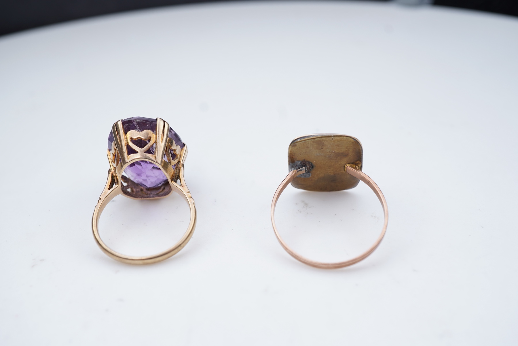Three rings and a brooch
